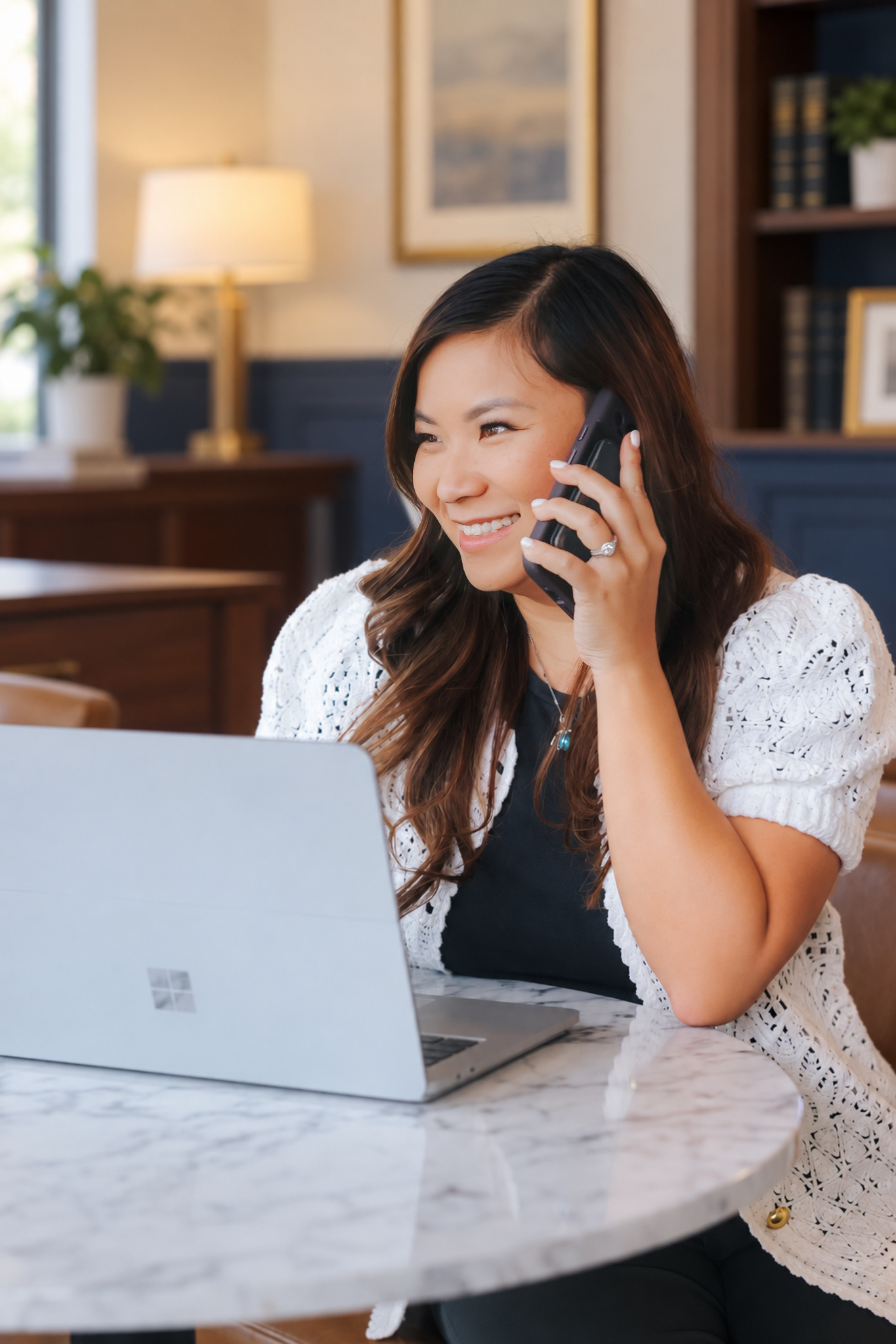 Natalie Nguyen speaking with a client by phone